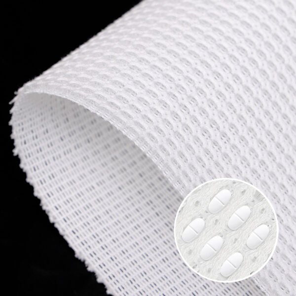 Biocompatible sandwich mesh fabric; pores hold medicated powder