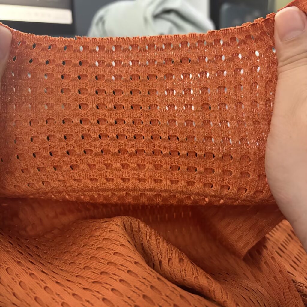 Dynamic Cross-Breeze Circulation Kinetic Wind-Shielding Breathable spacer fabric