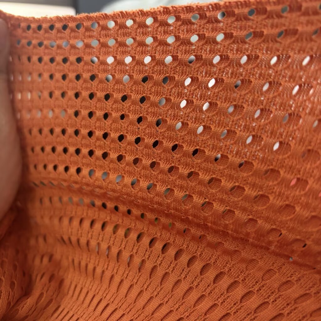 Kinetic Wind-Shielding Breathable spacer fabric active tension state